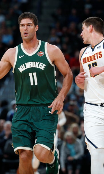 Lopez makes eight 3-pointers, Bucks beat Nuggets 121-114